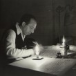 Aaron Copland by candlelight, studio in the Berkshires, September, 1946