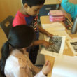 4th graders studying primary sources to learn about events from the Civil Rights Movement.