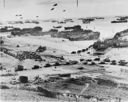 Bird's-eye view of landing craft, barrage balloons, and allied troops landing in Normandy