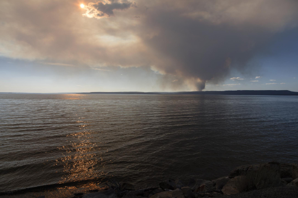 Smoke from a wildfire drifting over Lake Yellowstone in Wyoming.
